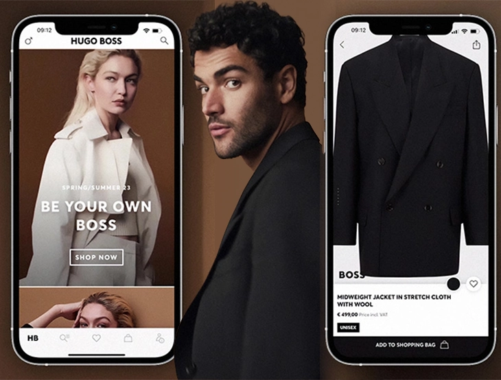 Mann steht zwischen zwei Smartphones, die die HUGO BOSS-Shopping-App mit Kleidung und Produktansicht anzeigen. (Foto)